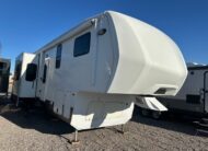 2012 Keystone Raptor RP395LEV Toy Hauler 5th wheel – 1 1/2 bathrooms!