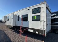 2012 Keystone Raptor RP395LEV Toy Hauler 5th wheel – 1 1/2 bathrooms!