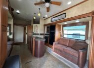 2012 Keystone Raptor RP395LEV Toy Hauler 5th wheel – 1 1/2 bathrooms!
