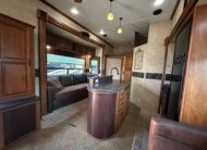 2012 Keystone Raptor RP395LEV Toy Hauler 5th wheel – 1 1/2 bathrooms!