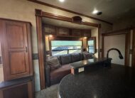2012 Keystone Raptor RP395LEV Toy Hauler 5th wheel – 1 1/2 bathrooms!