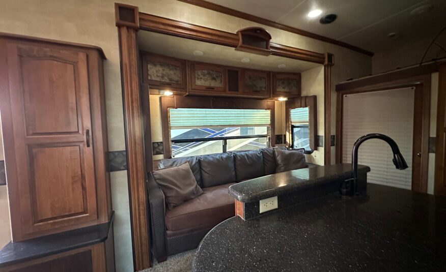 2012 Keystone Raptor RP395LEV Toy Hauler 5th wheel – 1 1/2 bathrooms!