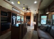2012 Keystone Raptor RP395LEV Toy Hauler 5th wheel – 1 1/2 bathrooms!