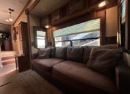2012 Keystone Raptor RP395LEV Toy Hauler 5th wheel – 1 1/2 bathrooms!