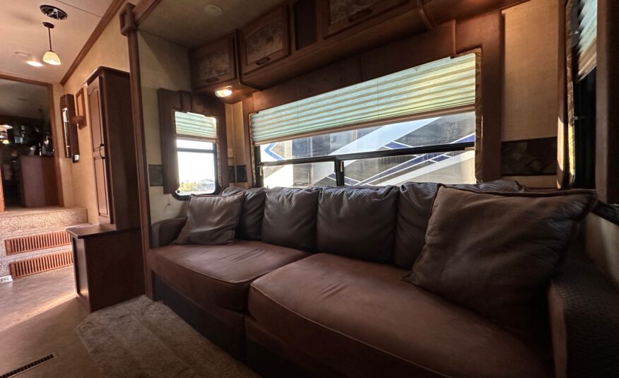 2012 Keystone Raptor RP395LEV Toy Hauler 5th wheel – 1 1/2 bathrooms!