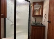 2012 Keystone Raptor RP395LEV Toy Hauler 5th wheel – 1 1/2 bathrooms!