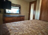 2012 Keystone Raptor RP395LEV Toy Hauler 5th wheel – 1 1/2 bathrooms!