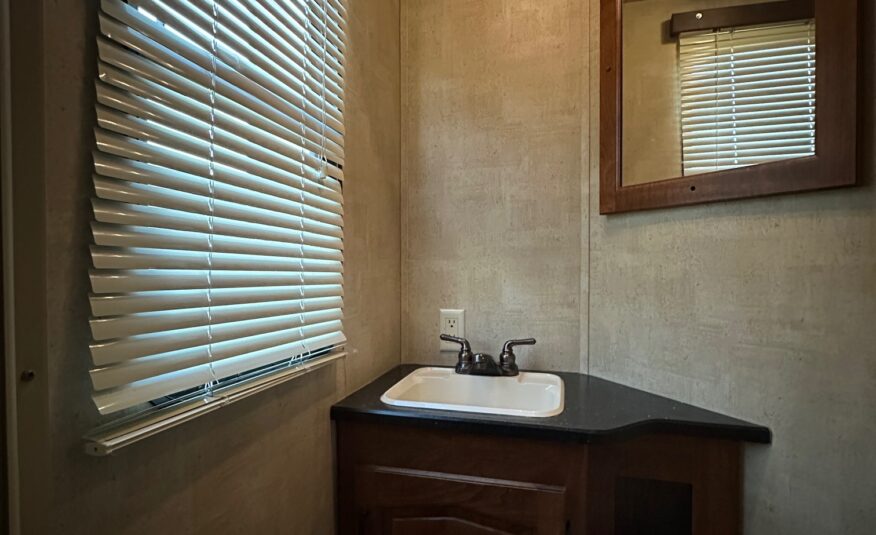 2012 Keystone Raptor RP395LEV Toy Hauler 5th wheel – 1 1/2 bathrooms!